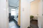 Wide view of bath/bedroom