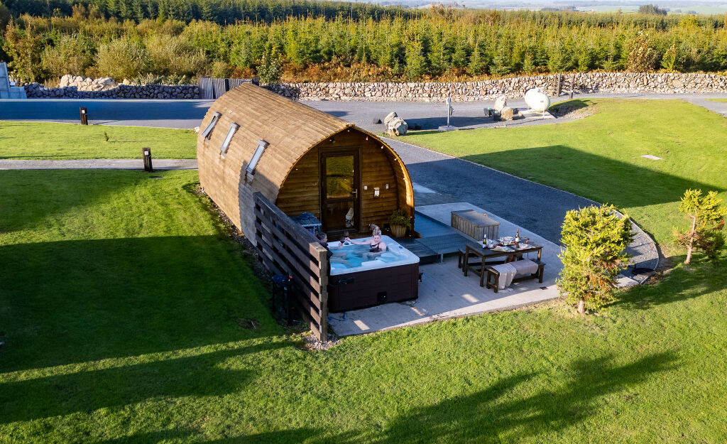 [{'Text': 'Pod and hot tub', 'CultureCode': 'en-GB'}] glamping cabins and grounds, photo 31 of 32