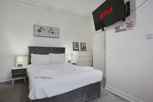 Well-presented bed with quality bedding