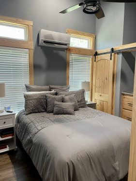 The Bedroom in the Wyldwood Cabin is inviting, yet relaxing!