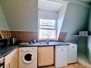 This photo represents the kitchen of the flat