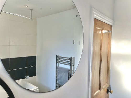 Bathroom - Modern bathroom with 3 piece suite and shower over the bath