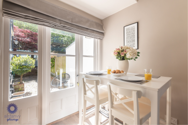 Dining area leading to courtyard garden