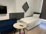 Apt.12Living area with 1 single and 1 double bed