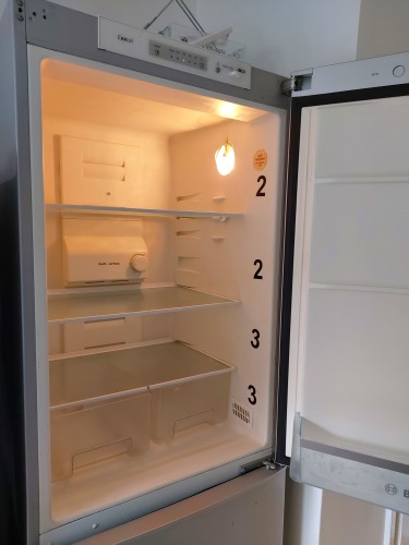 Shared fridge with numbered shelves