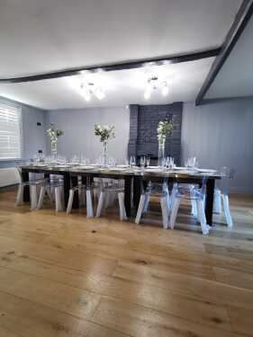 View of dining area from the formal seating area opposite the kitchen