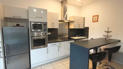 Cuisine américaine très bien équipée