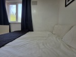 The second bedroom: simple, comfortable, and thoughtfully equipped. Double bed, wardrobe, and fresh towels – all ready for your arrival.