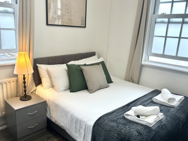 In each room: Microwave, plates, bowls, cutlery, tea, coffee, sugar, biscuits, kettle, mugs, drinking glasses