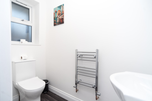 A clean, easily accessible ground-floor toilet — perfect for larger groups and contractor stays.
