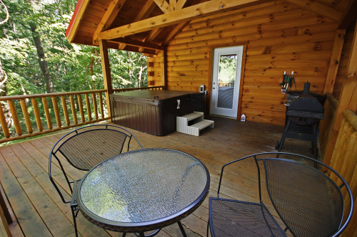Back Deck Details. Hot Tub, Grill, Table and Chairs