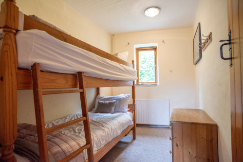 Cosy bunk bedroom ideal for children or additional guests, making family stays easy and comfortable.