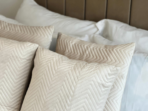 Contemporary bedroom with thoughtful touches for a comfortable stay.
