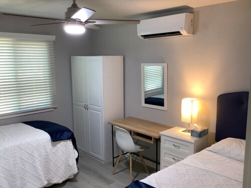 Twin bed has pillow tops, work space inside each bedroom