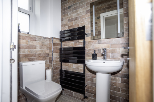 Modern En Suite - Brand-new design with cool décor and a heated towel rail for added comfort