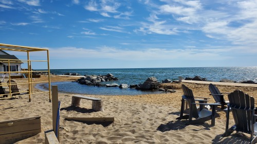 Monkey bars and adirondack chairs on our beachfront