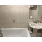 This photo represents the bathroom inside the flat. 