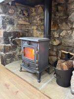 Wood fired log burning stove