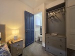 En-suite shower, 40" Smart TV, tea, coffee, and a bed. This single bedroom is basically a solo traveller's dream come true.