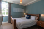 Jade bedroom with garden view