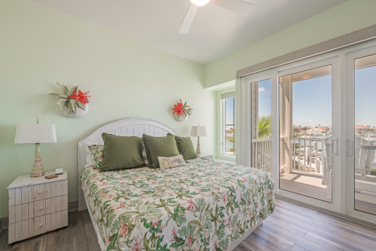 Primary suite has king bed, motorized blackout shades 