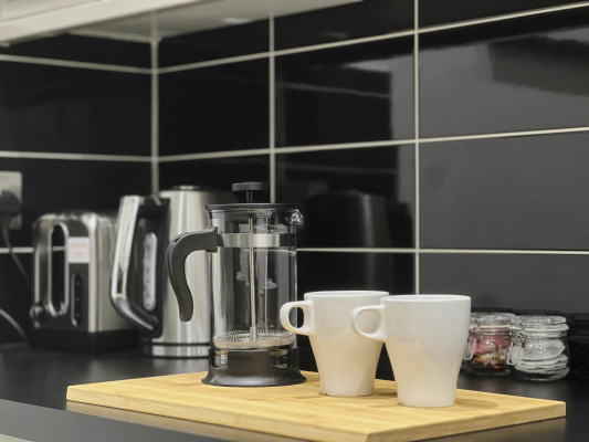 Well-stocked kitchen ideal for short or extended stays.
