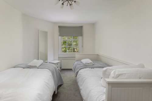 Bedroom 5: Two single beds over looking Abbey Green