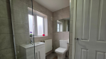 Designed with families and groups in mind, this bathroom offers both a bath and shower to suit all ages and preferences. Complimentary toiletries—including shower gel, shampoo, and conditioner—are provided for your convenience.

