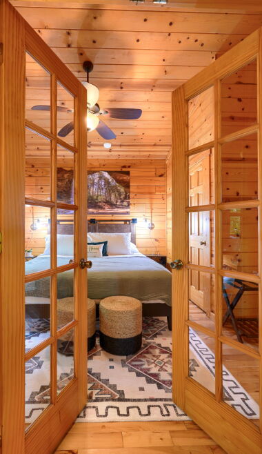 French doors to allow the later sleeper to be in peace