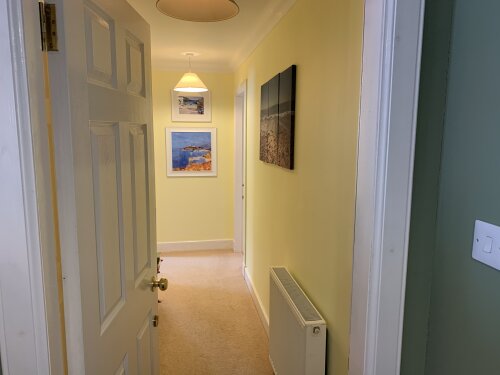 All three rooms in the house Family Suite are accessed from this private corridor