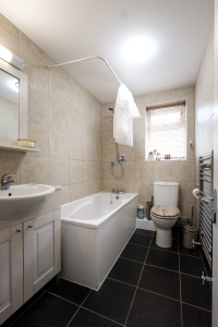 Bathroom with shower, bath and W.C.