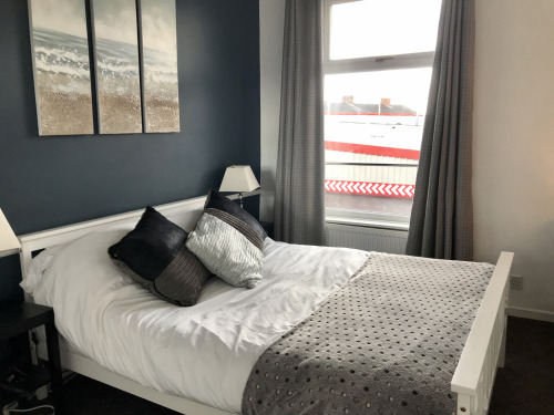 Bedroom One - With comfy double bed, wardrobe and chest of drawers