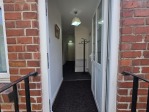 The entrance of this 2-bedroom flat sets the tone for a comfortable and convenient stay. From the moment you walk in, you'll have immediate access to two double bedrooms, a lounge with a sofa bed and Smart TV, a dining table for 4, and a modern shower room – making it perfect for contractors, groups, and weekend travellers alike.