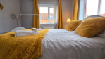 The ultimate guest suite. With a private en-suite, ample storage, and curated reading material, this first-floor bedroom feels like a mini retreat.