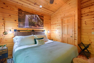 Large bedroom with luggage rack and closet