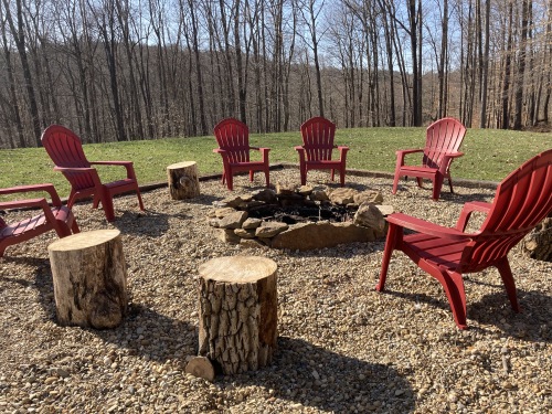 Fire pit in spacious back yard