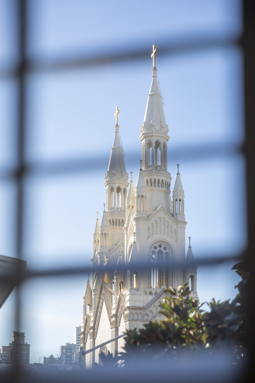 a white church with two steeples