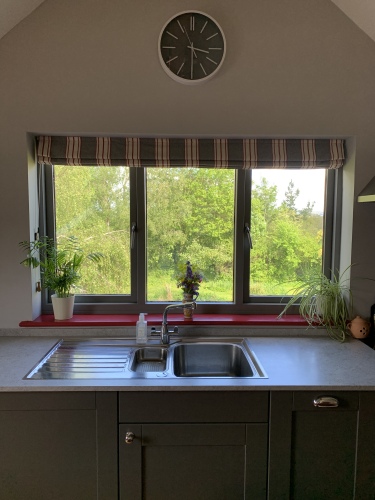 Kitchen window with views over garden and ponds