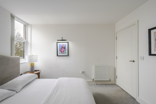 Retreat to this serene and stylish bedroom, designed for ultimate comfort and relaxation. With plush bedding, elegant décor, and soft ambient lighting, it offers a peaceful, luxurious haven to unwind and recharge.