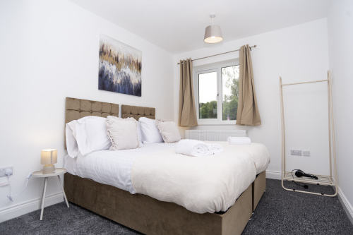 King zip-link bed that can be separated into two singles — set up to your preference for maximum comfort and flexibility during your stay.