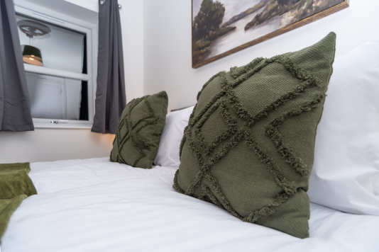 Supportive pillows and cushions for comfortable rest after long workdays.