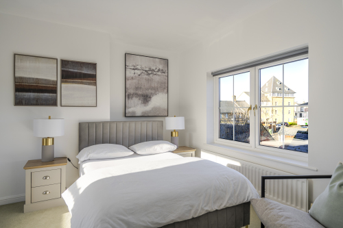 Sink into a luxurious double bed dressed in premium linens, framed by soft lighting and calming tones. This serene sanctuary offers a hotel-quality sleep experience and a peaceful escape from the day.
