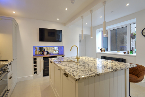 Kitchen is available for whole house bookings and leads to the rear courtyard