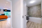 A welcoming corridor providing access to all rooms within the property.