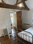 Bedroom 2 through to bed 1 and up to mezzanine