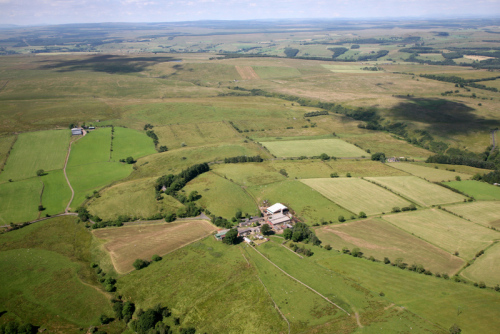 Kellah Farm from the sky in the foreground