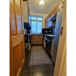 This photo represent the kitchen of the property. 