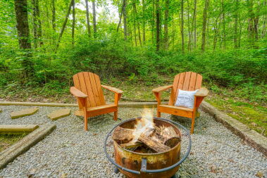 Outdoor fire pit area with string lights
