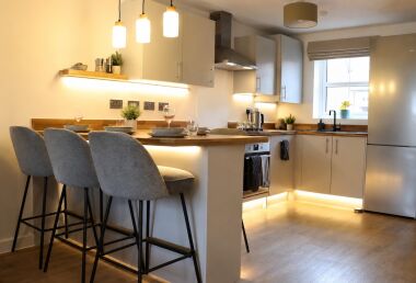 Well-equipped kitchen with a full-size fridge freezer, generous food storage space and a complete selection of provided tableware and cookware - making it easy to prepare, store and enjoy meals during your stay.