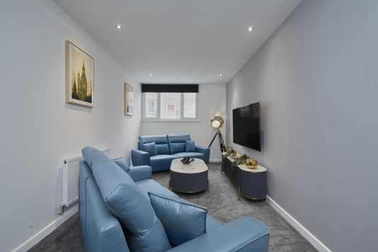 A bright and inviting living space designed for comfort and relaxation.